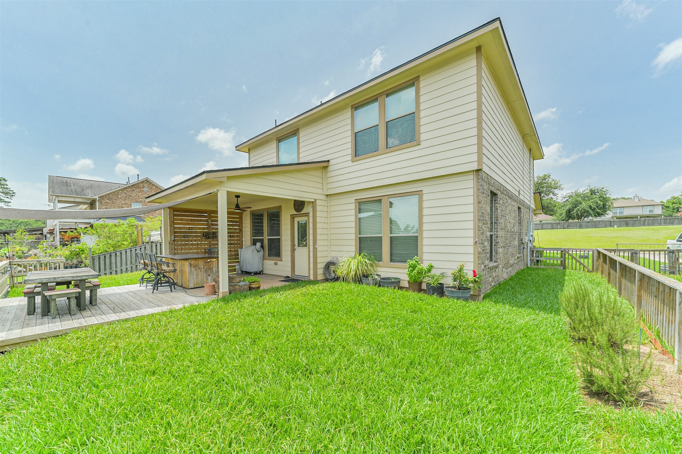 12009 La Salle River Road Conroe, TX 77304 - Photo 41 of 50 a view of a house with a yard and sitting area