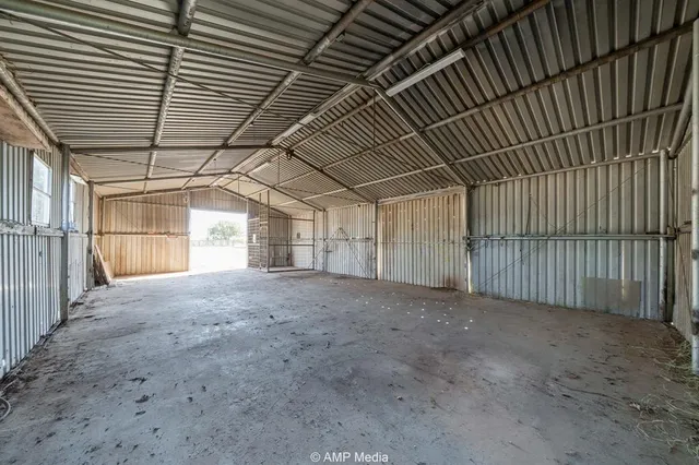 a view of empty room with windows