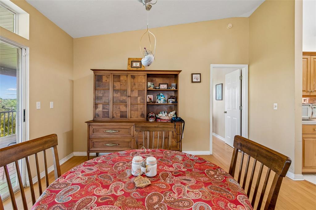 119 Burns Road Terra Ceia, FL 34250 - Photo 28 of 100 a bedroom with a bed and wooden floor