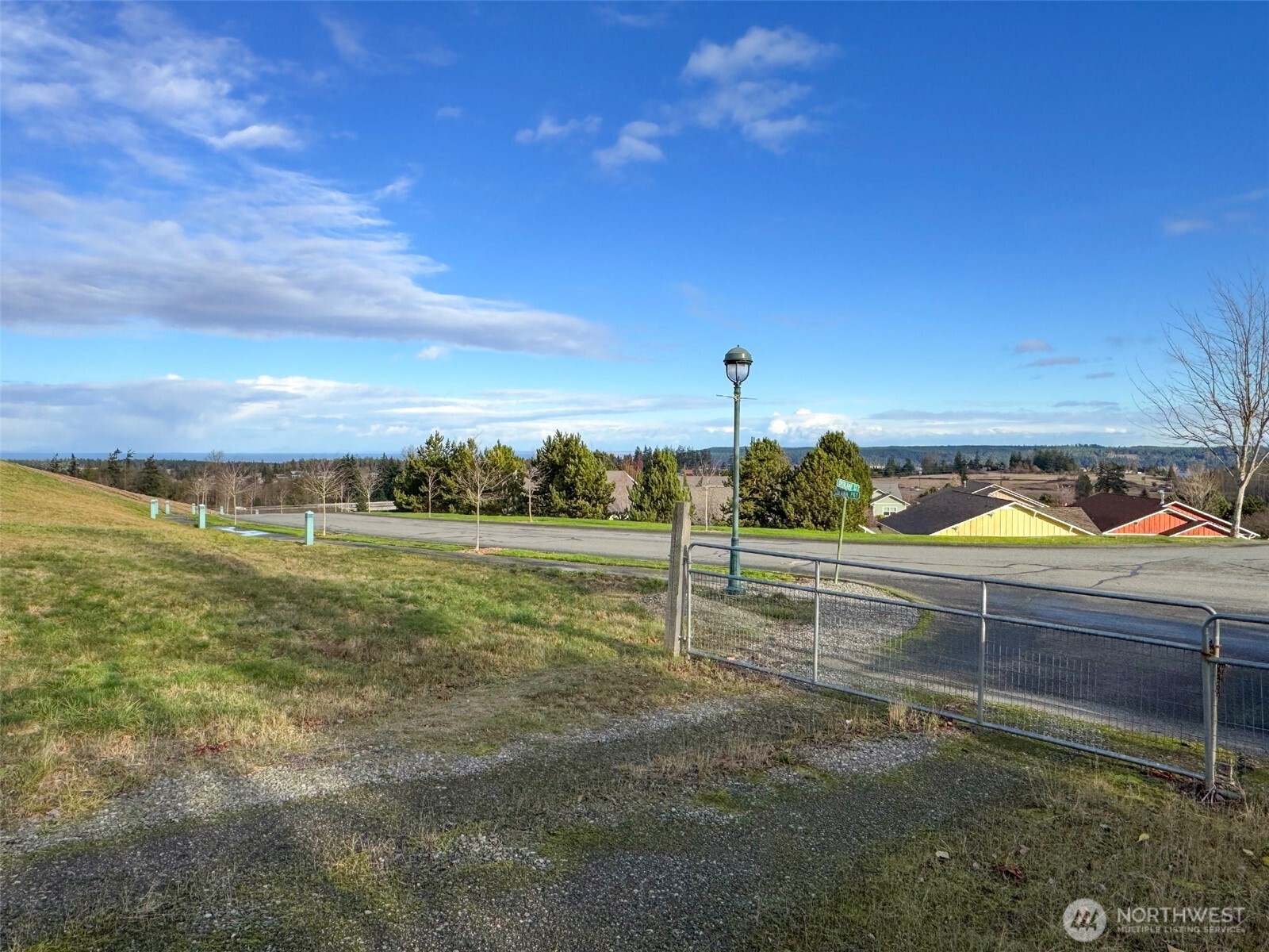 9999 Solana Parkway Sequim, WA 98382 - Photo 12 of 40 a view of a lake with a big yard