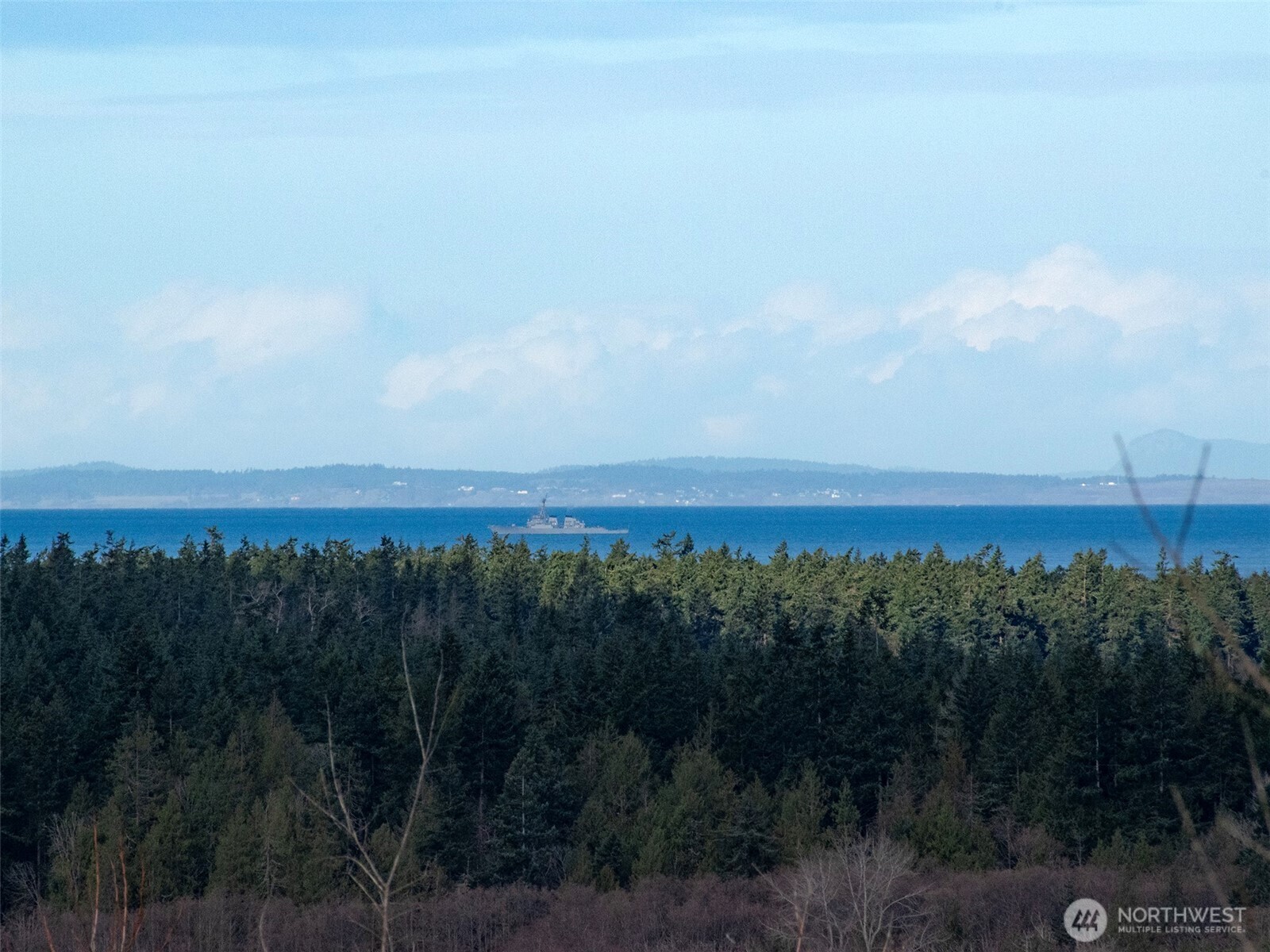 9999 Solana Parkway Sequim, WA 98382 - Photo 17 of 40 a view of a city and lush green forest