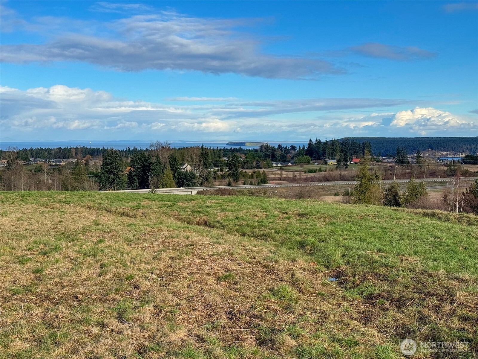 9999 Solana Parkway Sequim, WA 98382 - Photo 29 of 40 a view of a lake with a big yard