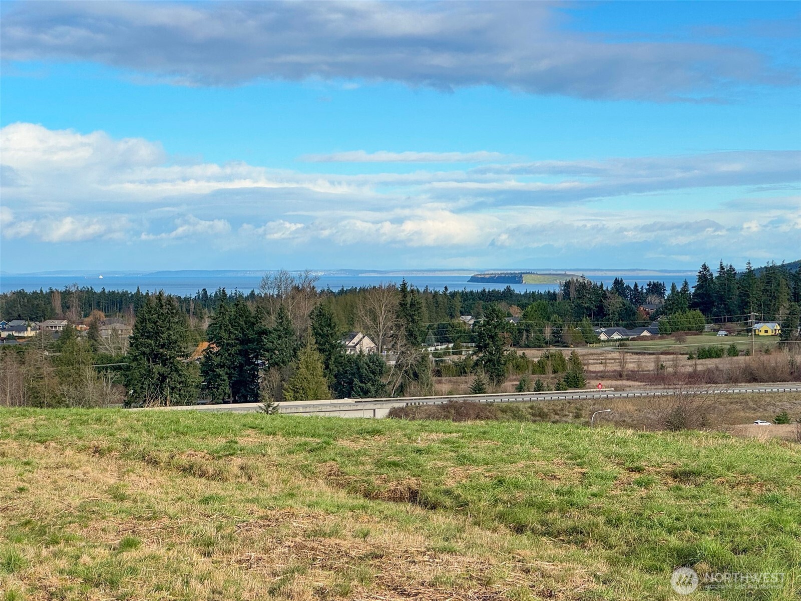 9999 Solana Parkway Sequim, WA 98382 - Photo 30 of 40 a view of lake with a yard