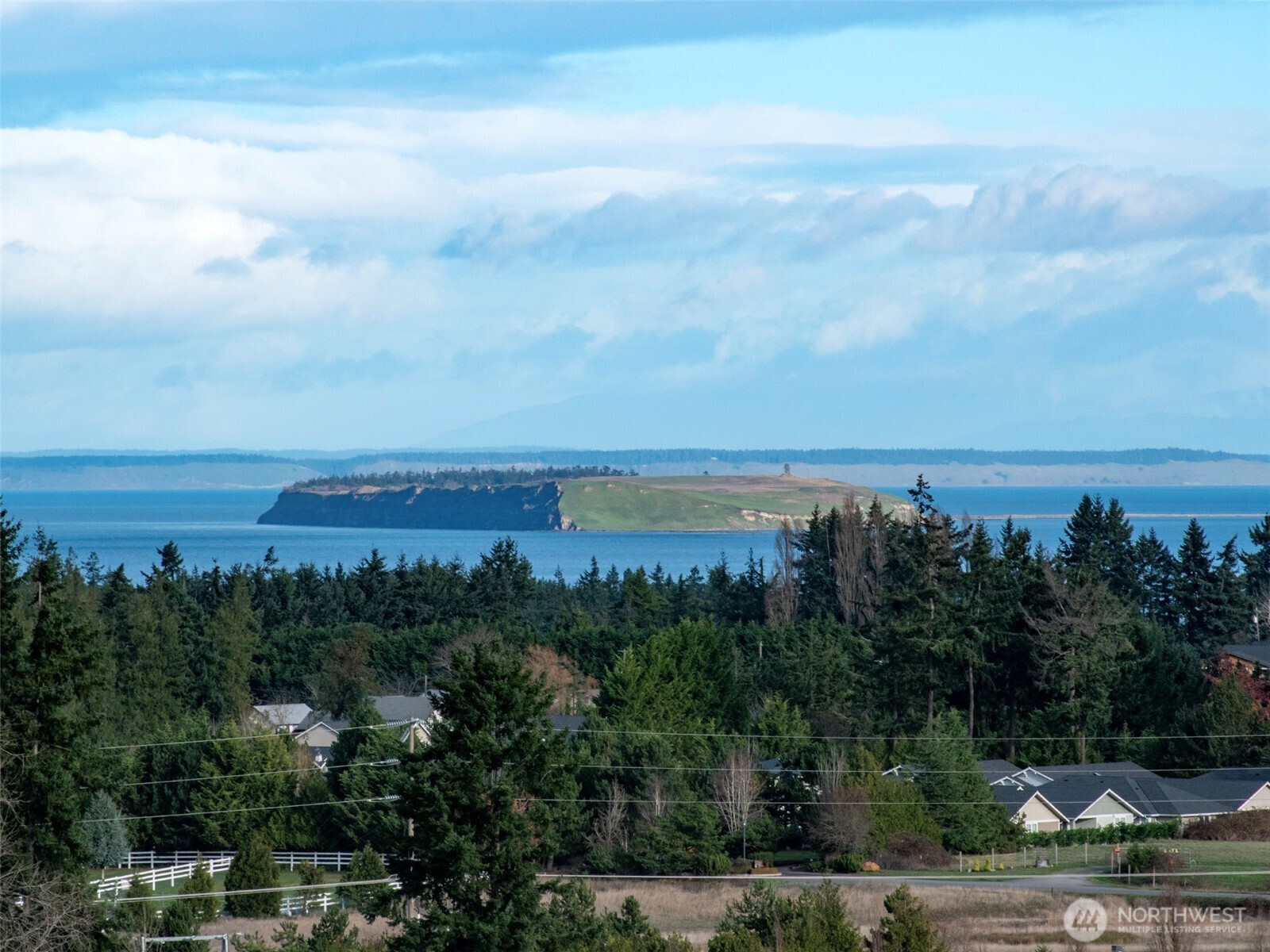 9999 Solana Parkway Sequim, WA 98382 - Photo 3 of 40 an aerial view of residential building and lake