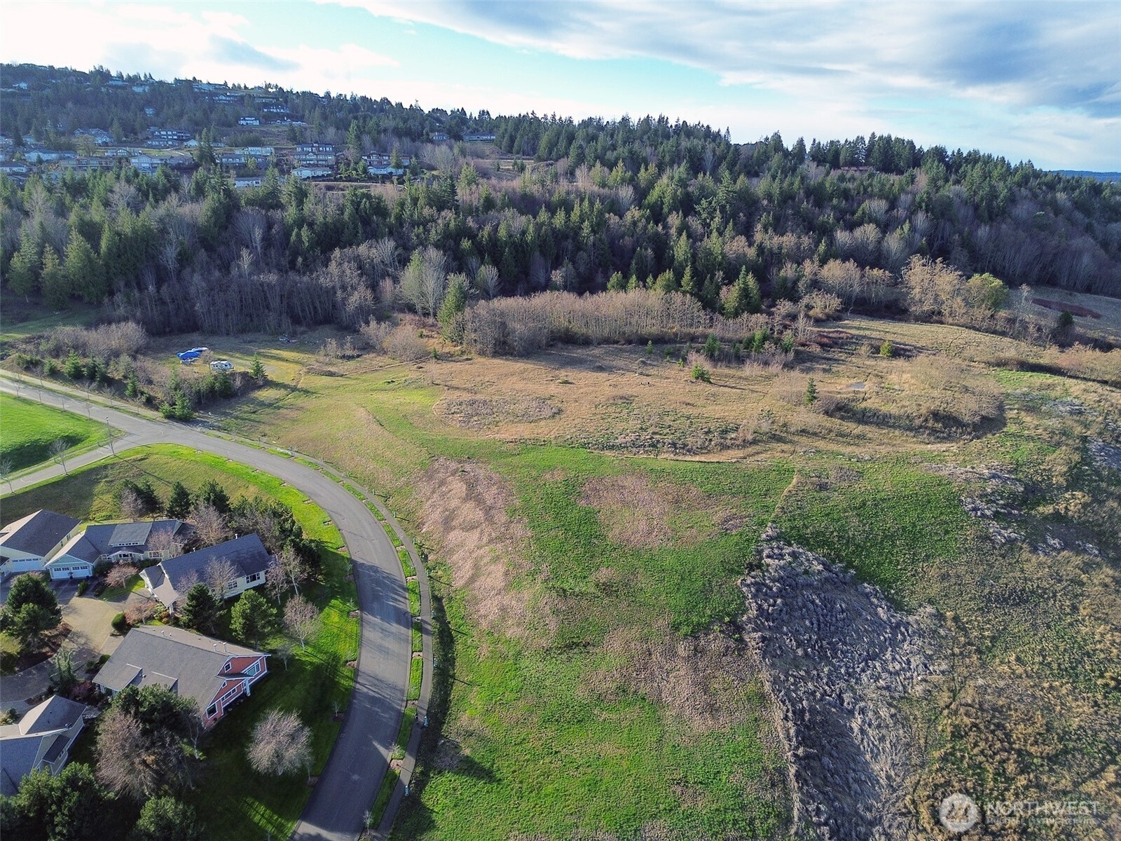 9999 Solana Parkway Sequim, WA 98382 - Photo 34 of 40 a view of a swimming pool and mountains