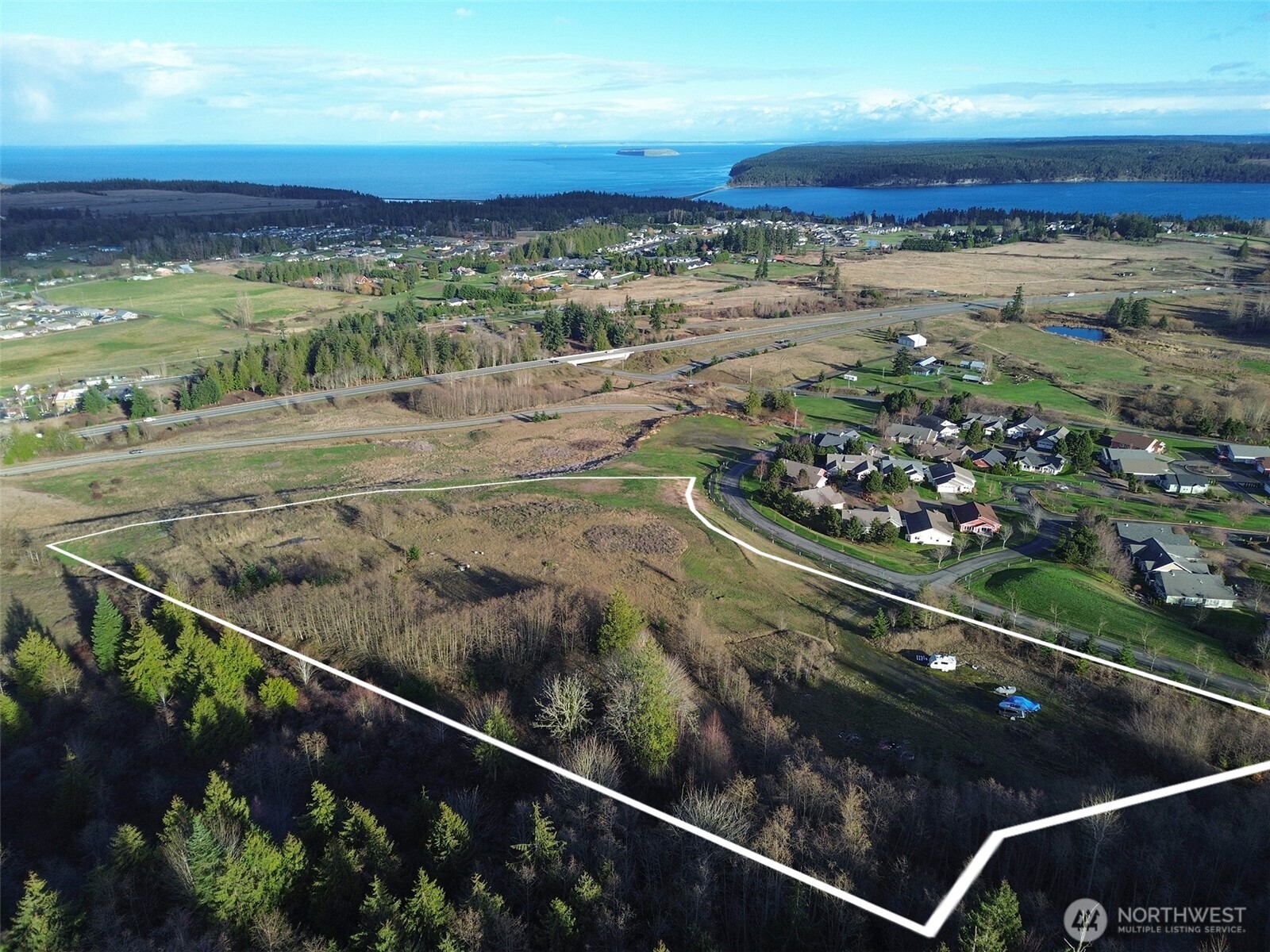 9999 Solana Parkway Sequim, WA 98382 - Photo 5 of 40 a view of a lake from a balcony