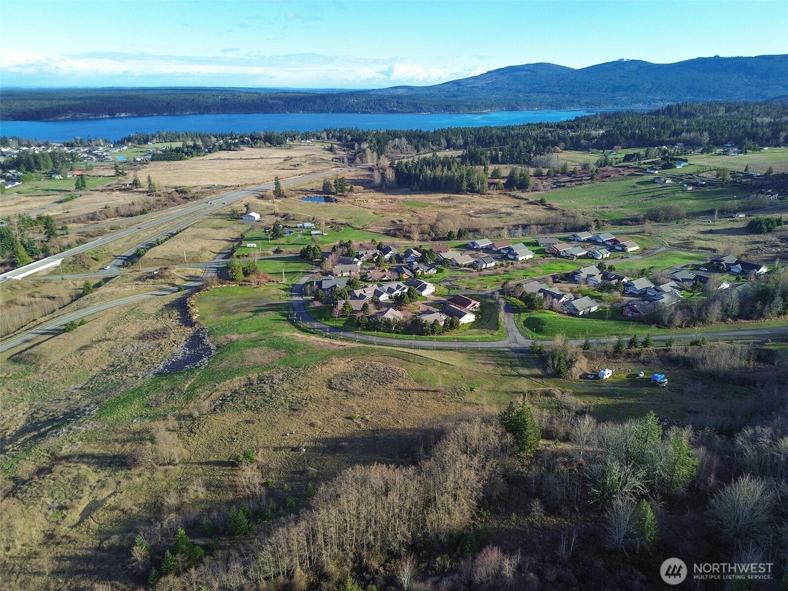 9999 Solana Parkway Sequim, WA 98382 - Photo 6 of 40 a view of a garden with a lake