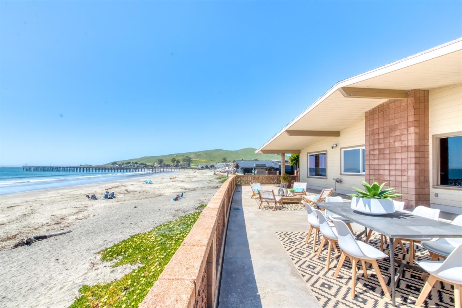8 Ocean Front Lane Cayucos, CA 93430 - Photo 1 of 32 a view of swimming pool with outdoor seating and a garden