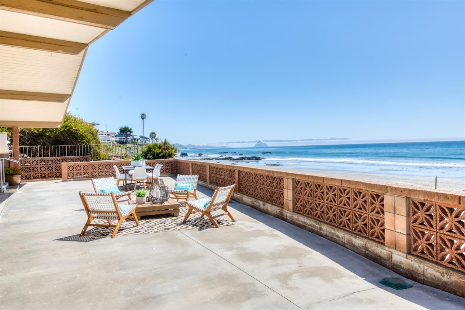 8 Ocean Front Lane Cayucos, CA 93430 - Photo 2 of 32 a terrace with outdoor seating and city view