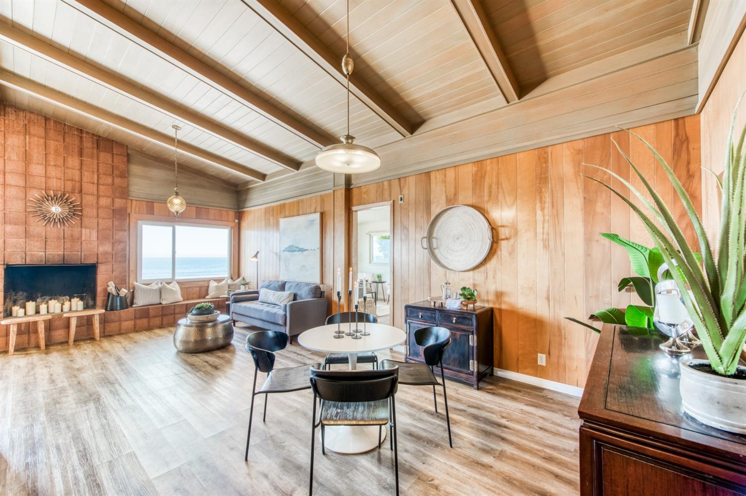 8 Ocean Front Lane Cayucos, CA 93430 - Photo 11 of 32 a view of a dining room with furniture window and wooden floor