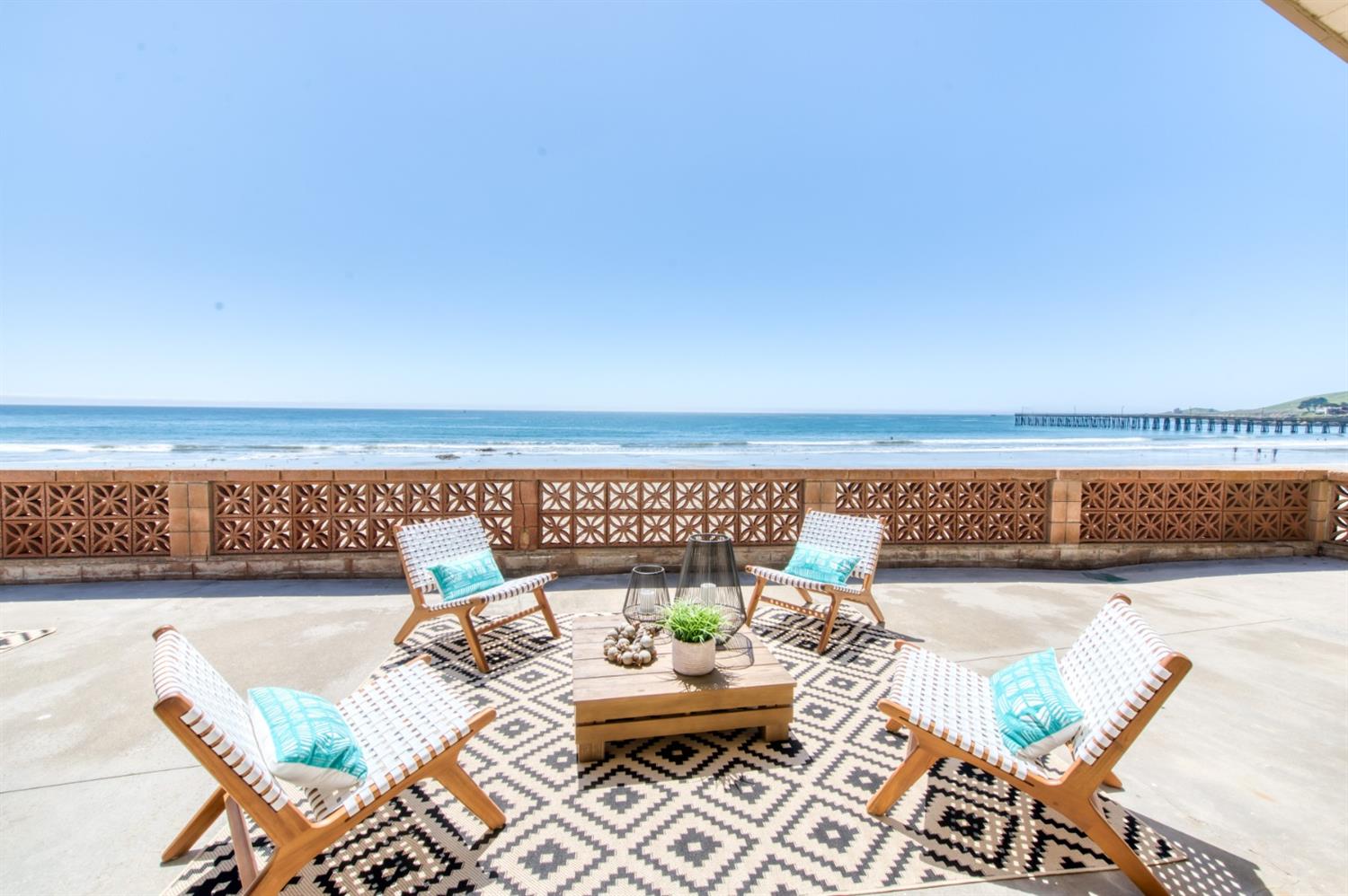 8 Ocean Front Lane Cayucos, CA 93430 - Photo 3 of 32 a view of a patio with furniture and stove