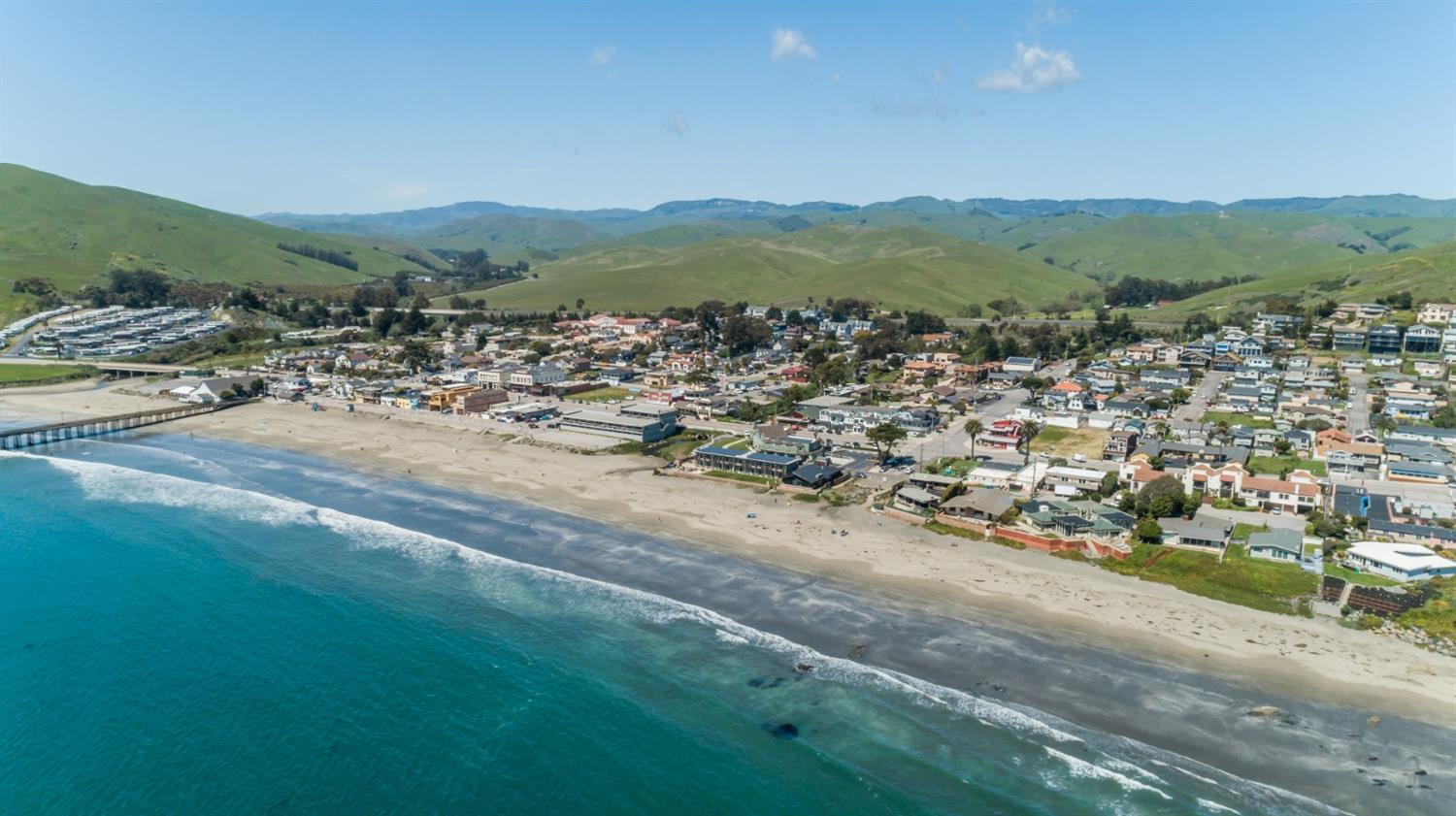 8 Ocean Front Lane Cayucos, CA 93430 - Photo 29 of 32 a view of a town with mountains in the background