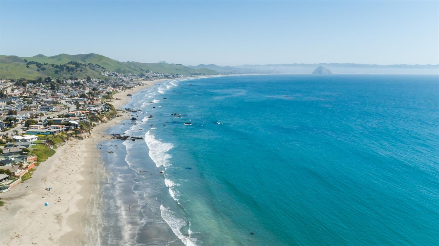 8 Ocean Front Lane Cayucos, CA 93430 - Photo 31 of 32 a view of a lake with mountains in the background