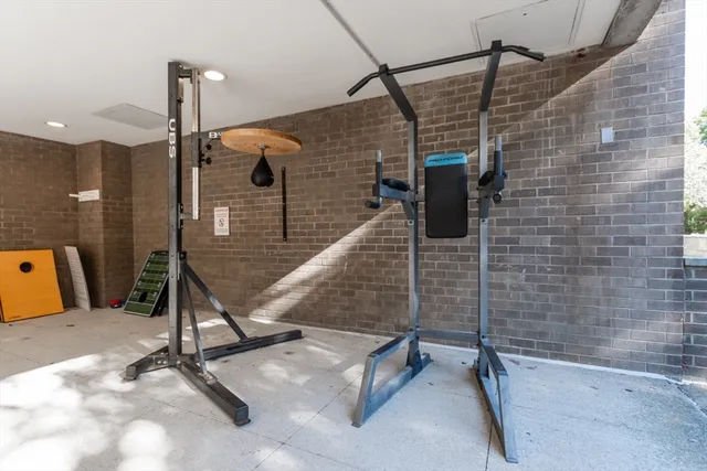 a view of a hall with a flat screen tv