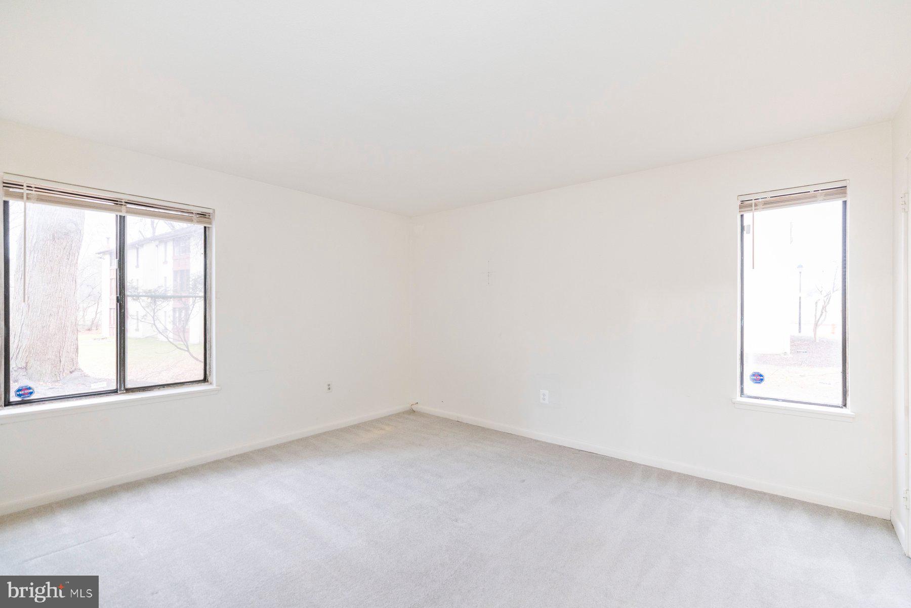 5866 Thunder Hill Road, Unit A4 Columbia, MD 21045 - Photo 11 of 20 an empty room with a window