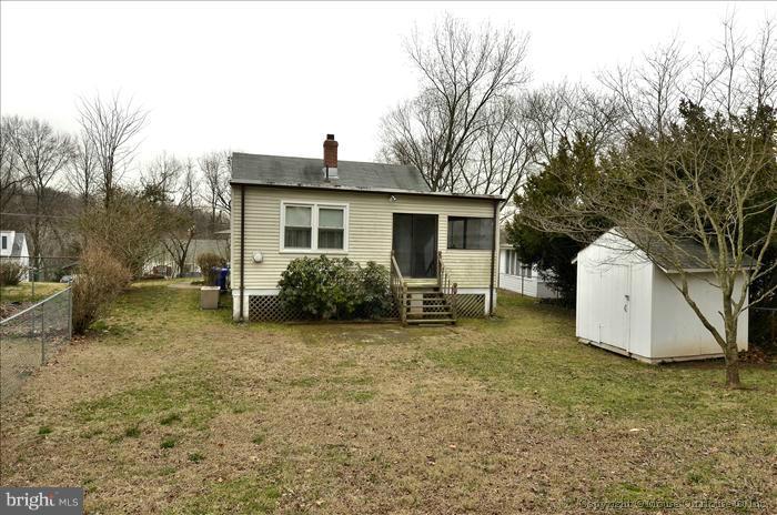 4219 Round Hill Road Silver Spring, MD 20906 - Photo 4 of 19 a view of a house with backyard