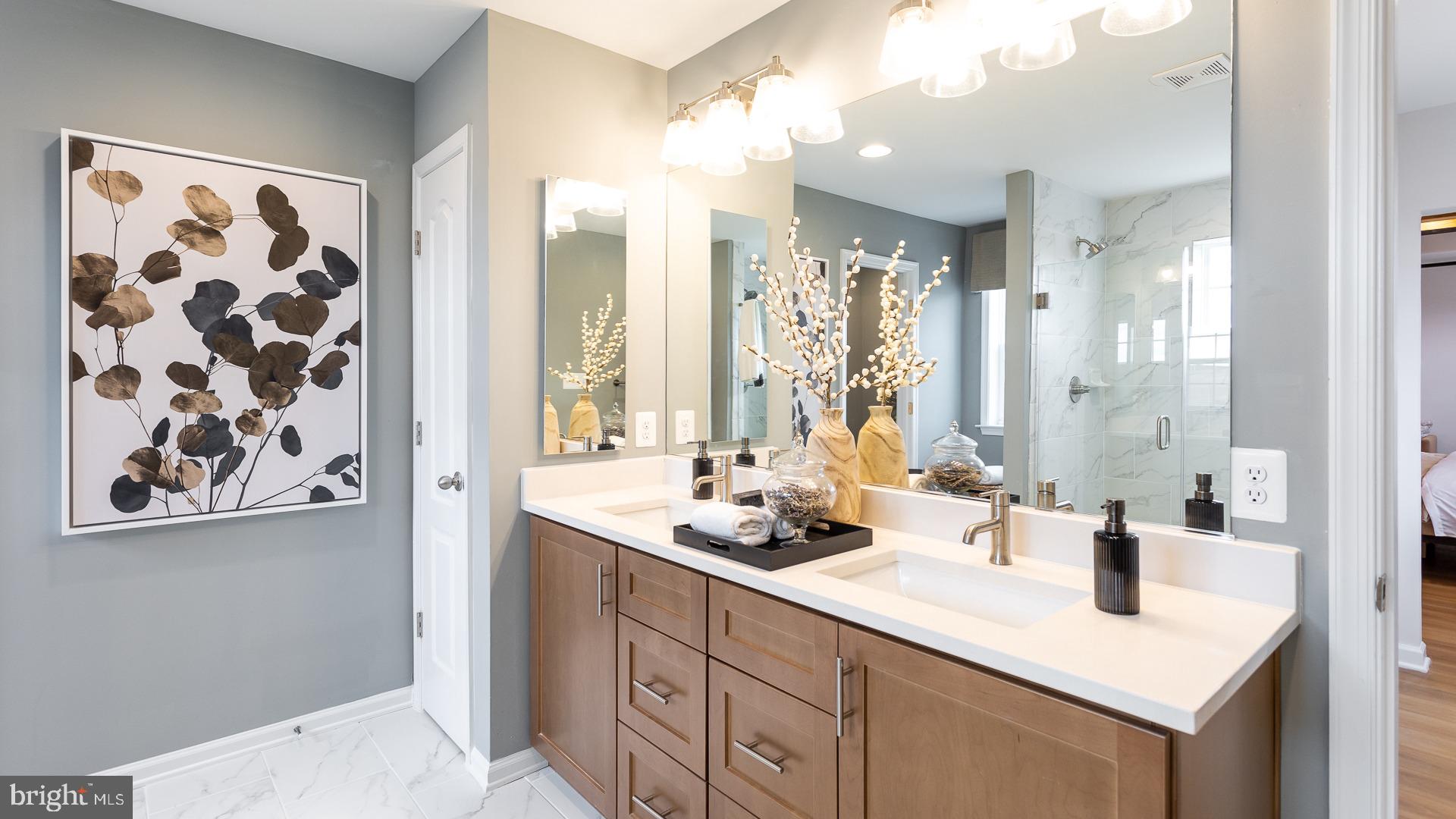 Tbb Monocacy Crossing Parkway, Unit REGENT Brunswick, MD 21716 - Photo 15 of 40 a bathroom with double vanity sinks a shower and a mirror