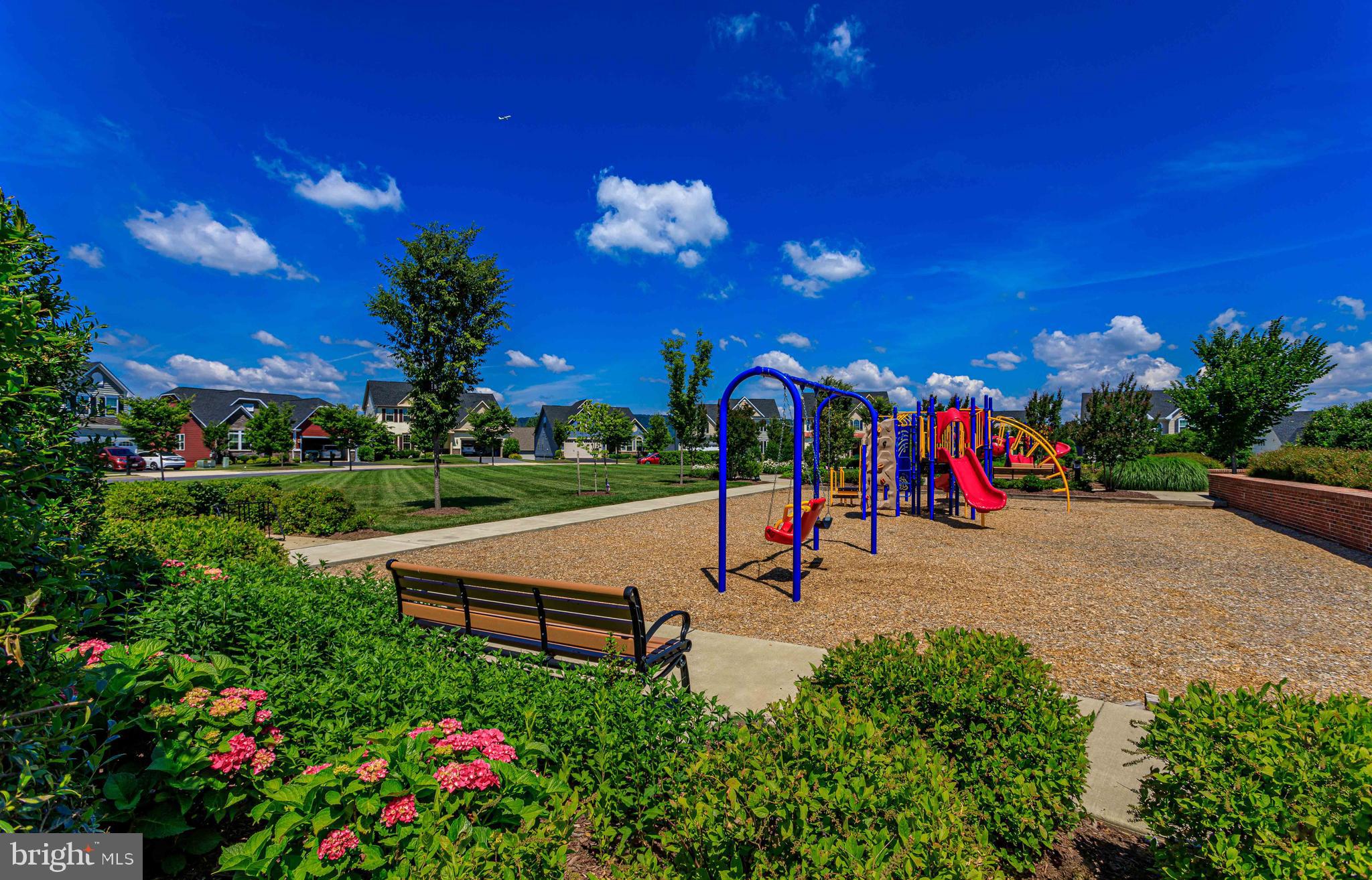 Tbb Monocacy Crossing Parkway, Unit REGENT Brunswick, MD 21716 - Photo 25 of 40 a view of a park with swings and slides