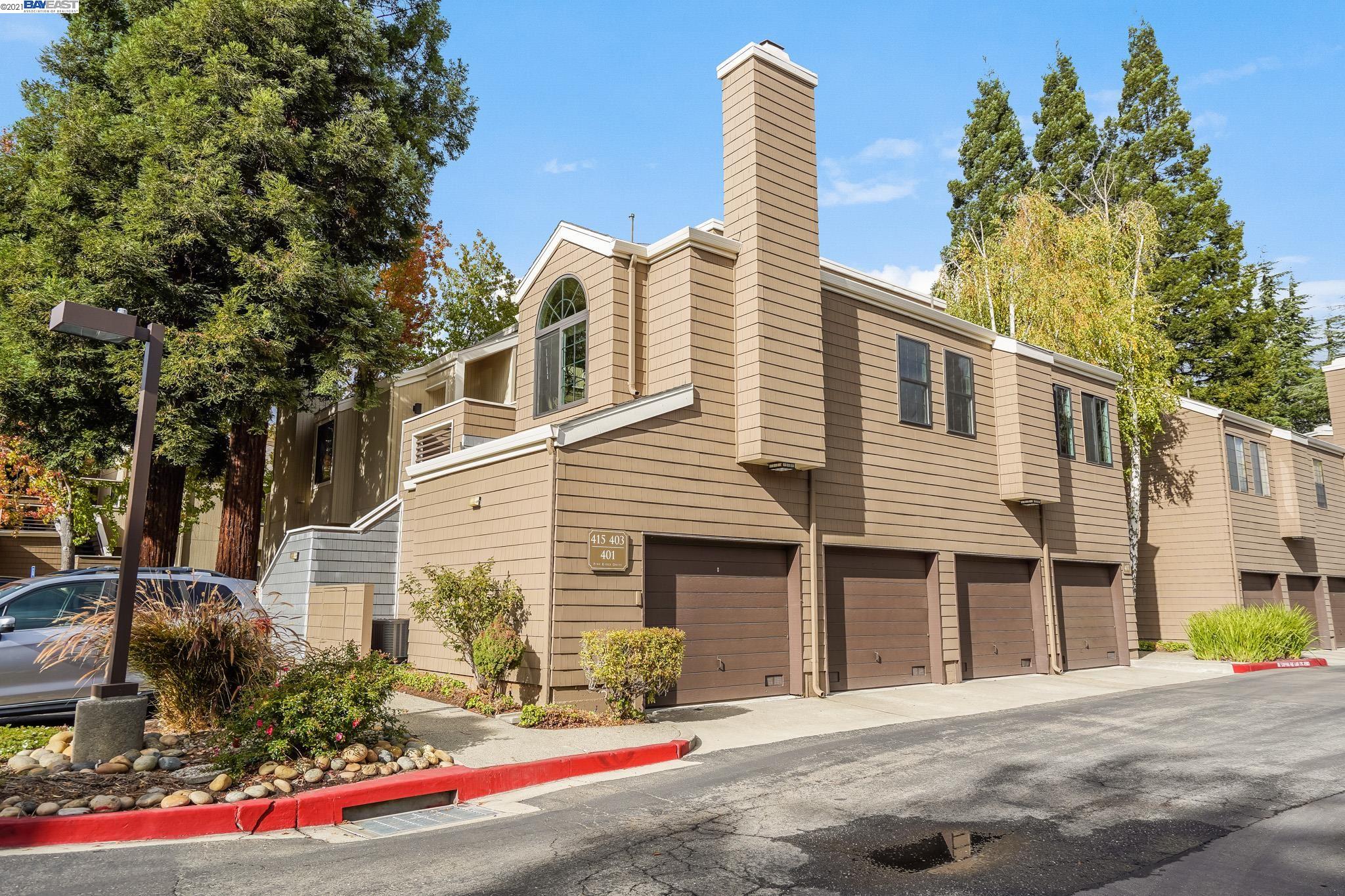 415 Pine Ridge Drive San Ramon, CA 94582 - Photo 1 of 1 a front view of a house with a garden