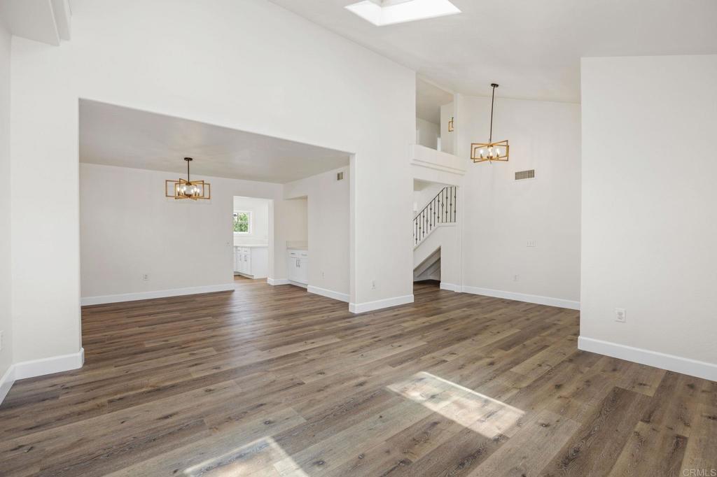 4595 Blackwell Road Oceanside, CA 92056 - Photo 6 of 47 a view of empty room with wooden floor