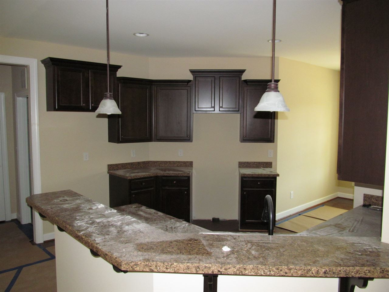 17 Savannah Ridge Court Angier, NC 27501 - Photo 7 of 24 Large Open Kitchen with Stainless Appliances, Pantry and Hardwoods Kitchen