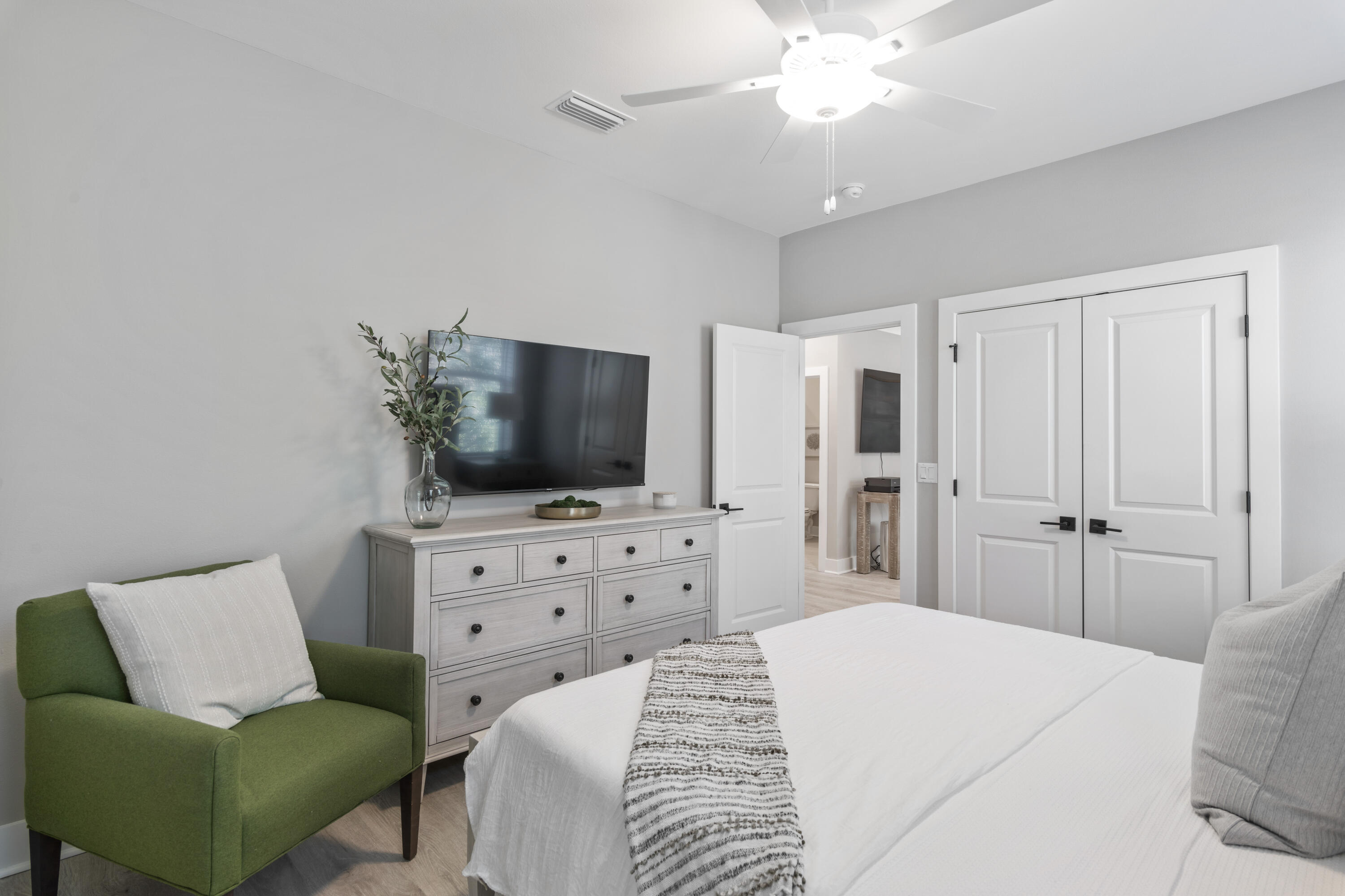 95 West Willow Mist Road Inlet Beach, FL 32461 - Photo 21 of 49 a bedroom with a bed flat screen tv and a couch