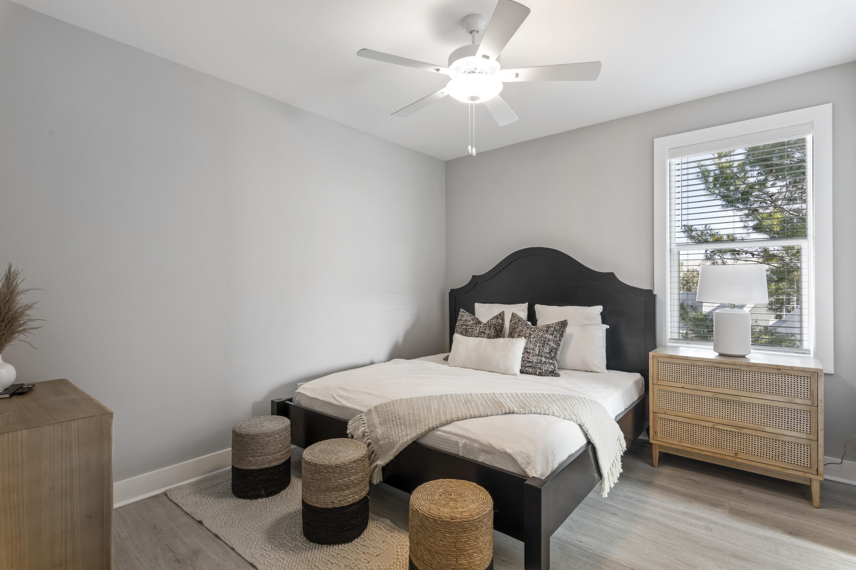 95 West Willow Mist Road Inlet Beach, FL 32461 - Photo 26 of 49 a bedroom with a bed and a chandelier