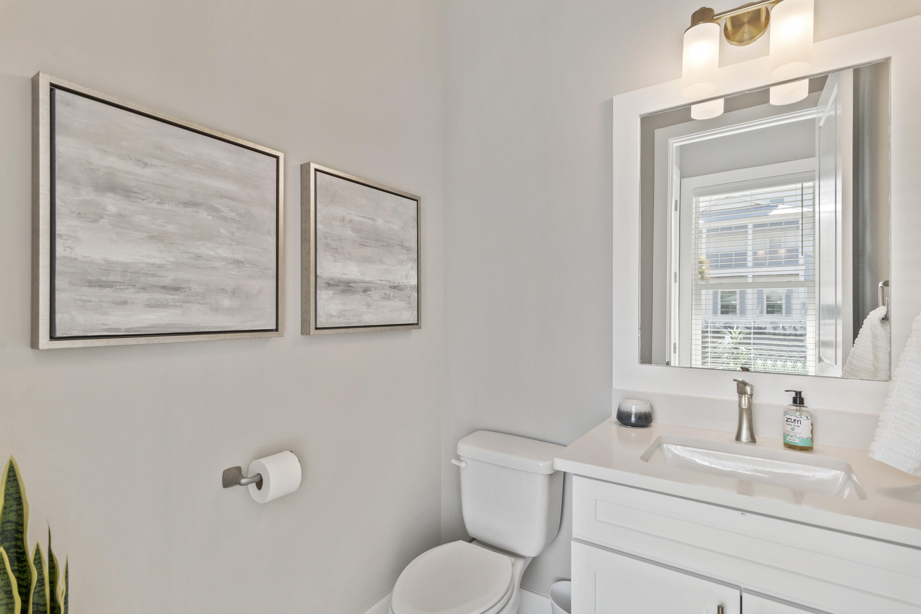 95 West Willow Mist Road Inlet Beach, FL 32461 - Photo 29 of 49 a bathroom with a toilet sink vanity and mirror