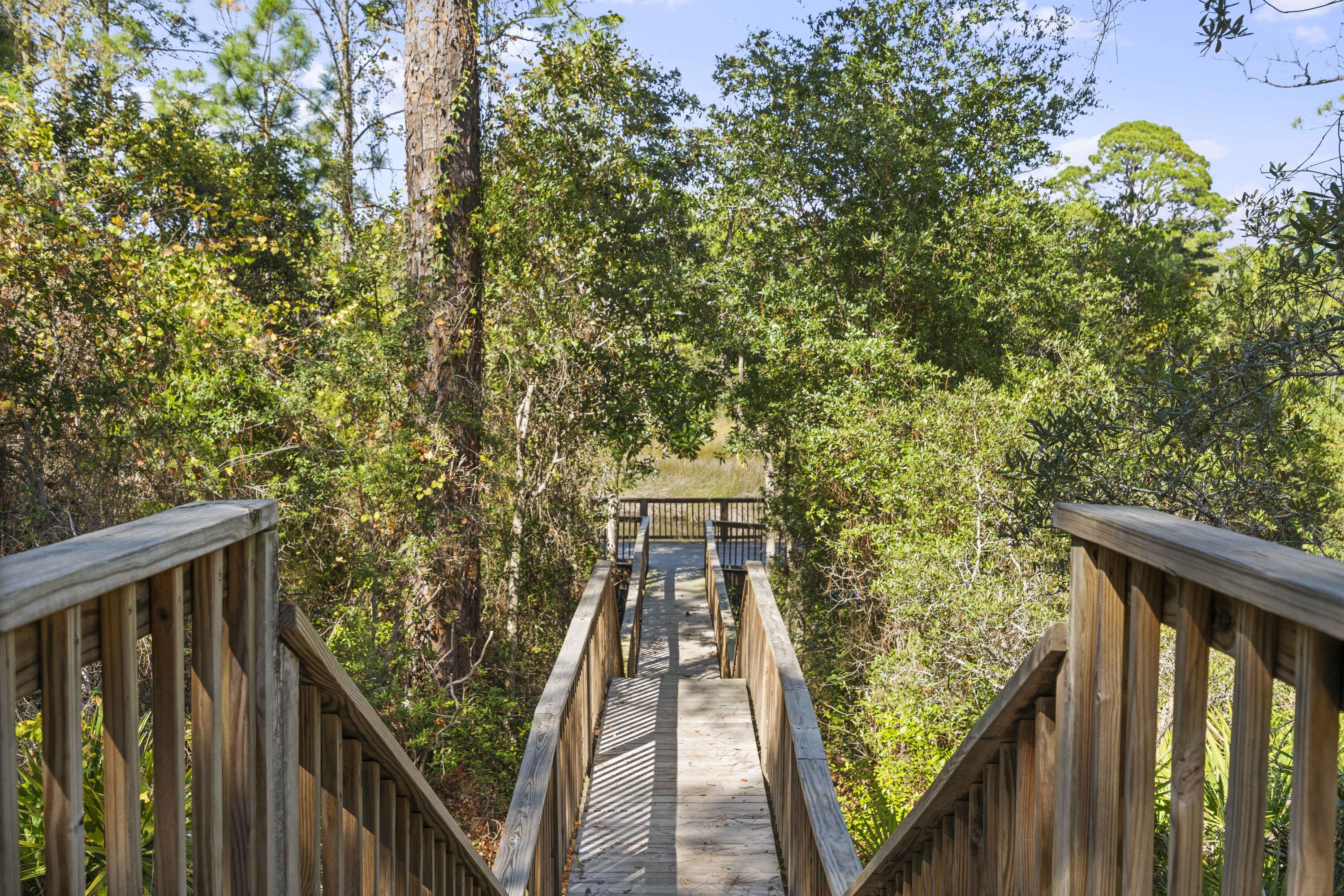 95 West Willow Mist Road Inlet Beach, FL 32461 - Photo 33 of 49 a view of balcony with wooden floor and fence