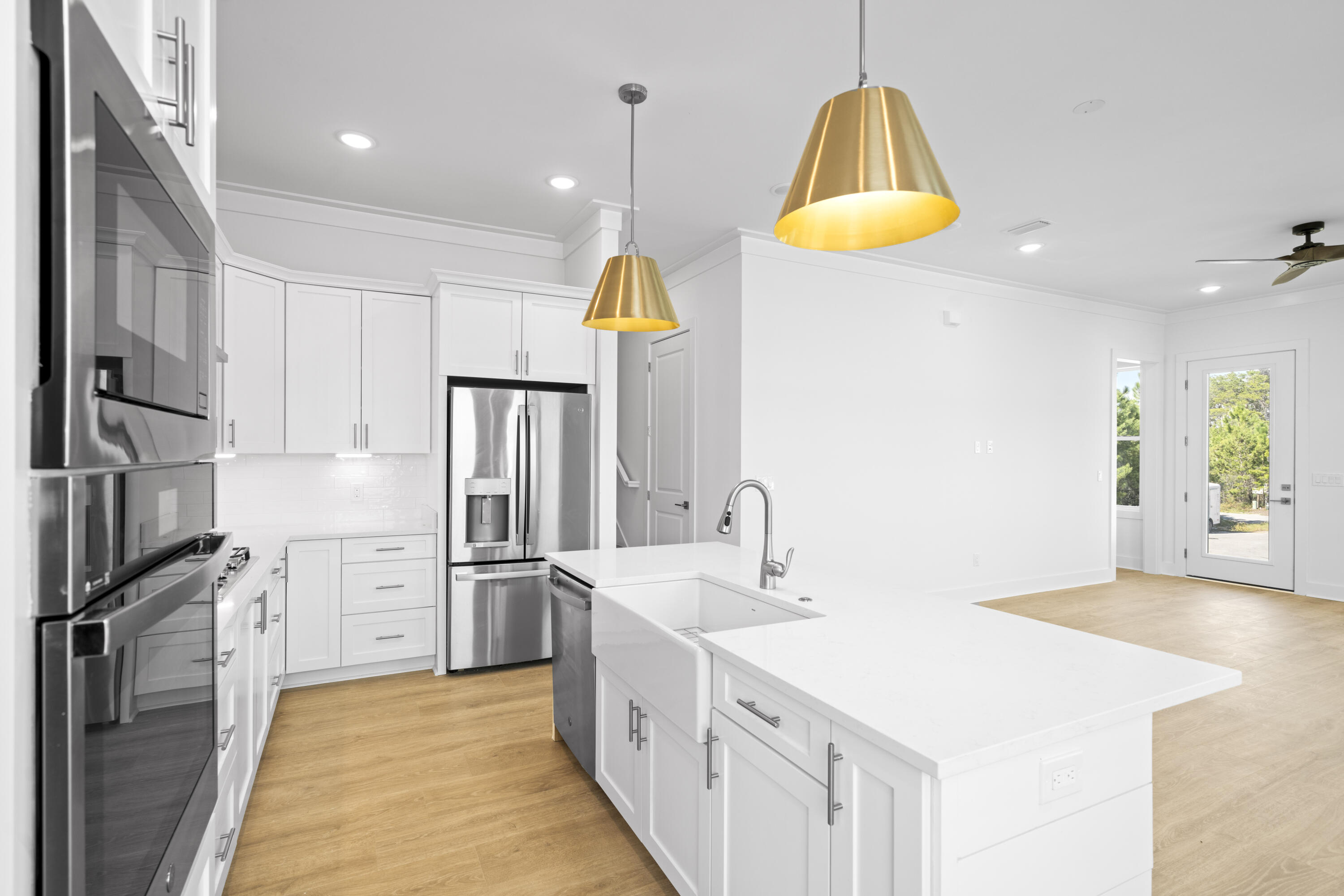 95 West Willow Mist Road Inlet Beach, FL 32461 - Photo 5 of 49 a kitchen with stainless steel appliances granite countertop a sink a stove and a refrigerator
