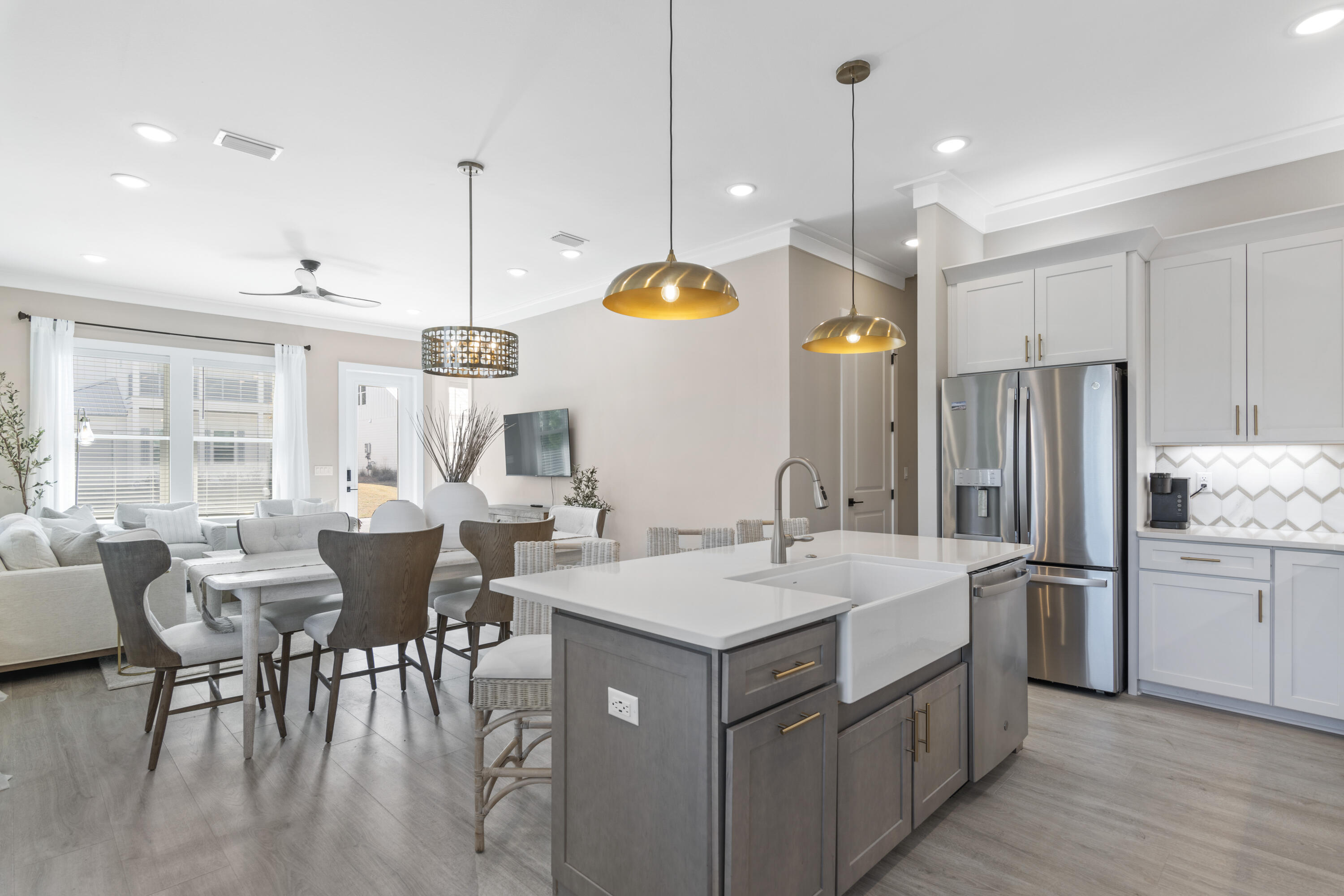 95 West Willow Mist Road Inlet Beach, FL 32461 - Photo 7 of 49 a kitchen with sink cabinets and dining table