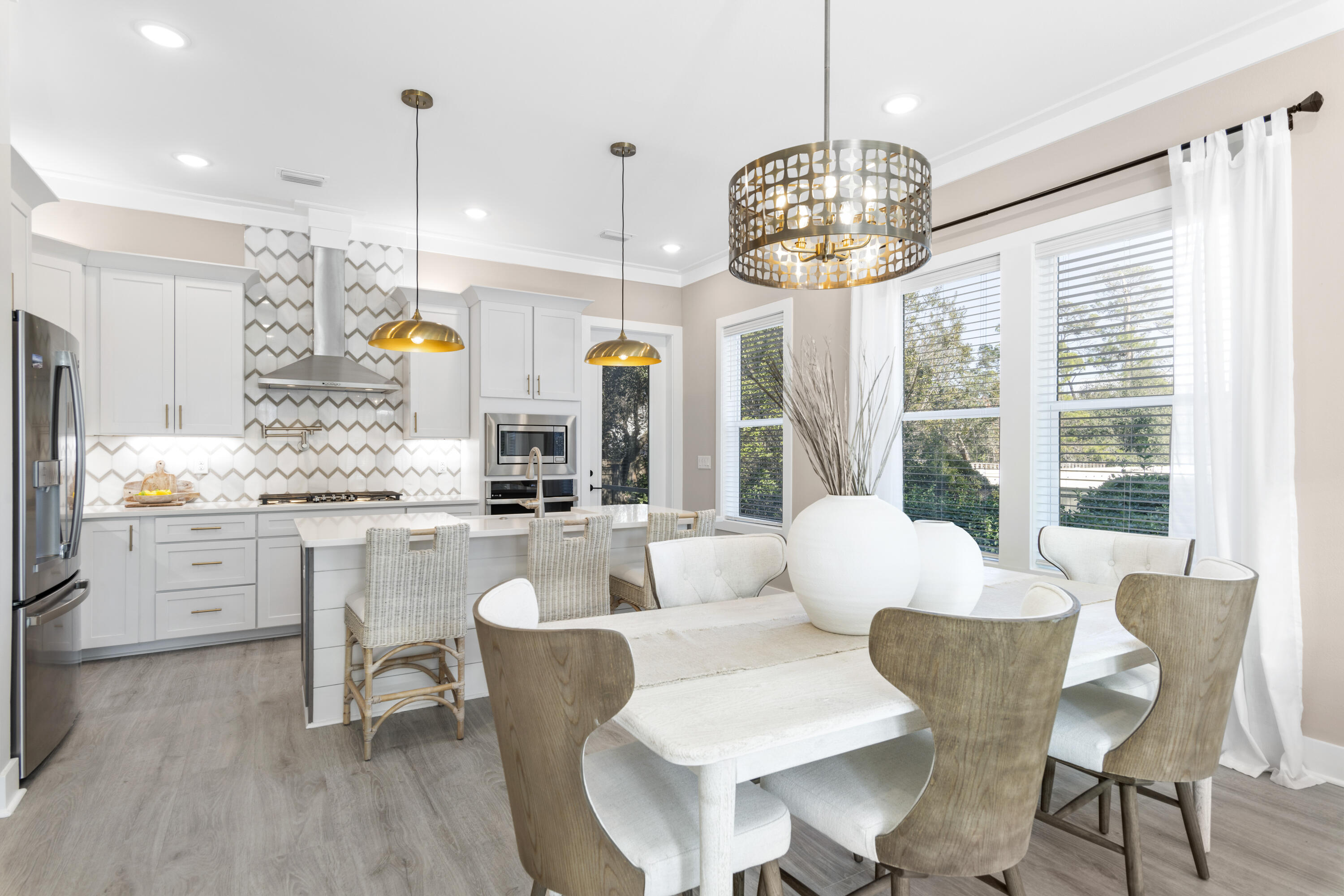95 West Willow Mist Road Inlet Beach, FL 32461 - Photo 8 of 49 a very nice looking dining room with wooden floor and large windows