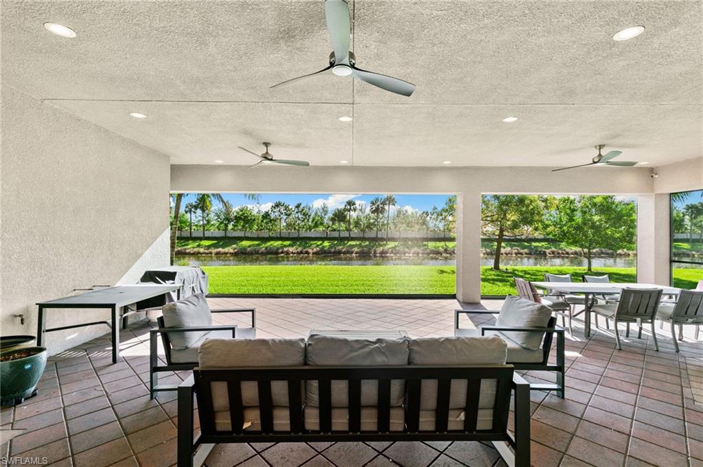 4370 Caldera Circle Naples, FL 34119 - Photo 23 of 35 a view of a dining room with furniture window and outside view