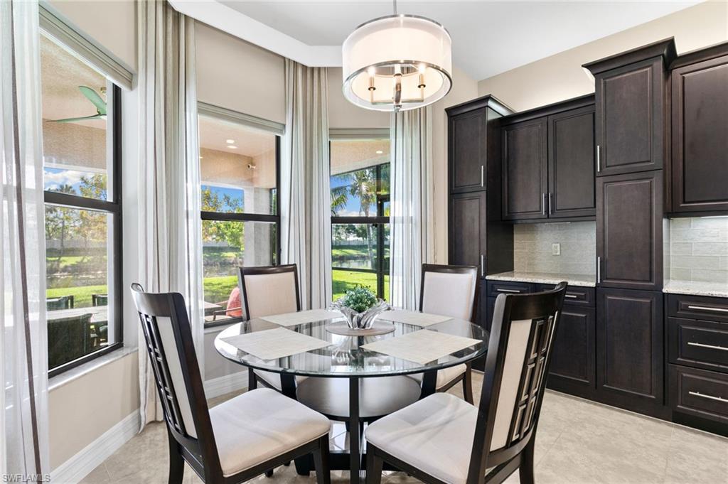 4370 Caldera Circle Naples, FL 34119 - Photo 5 of 35 a view of a dining room with furniture window and outside view