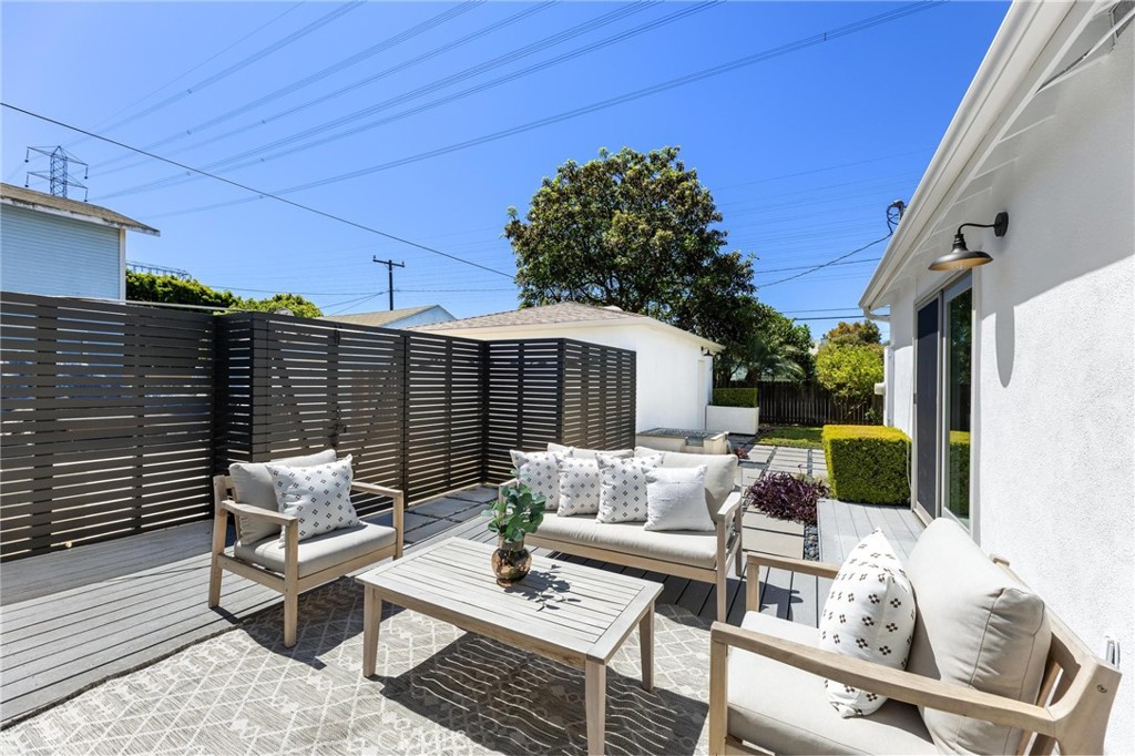 3219 Gibson Place Redondo Beach, CA 90278 - Photo 13 of 47 a view of a patio with couches table and chairs and potted plants
