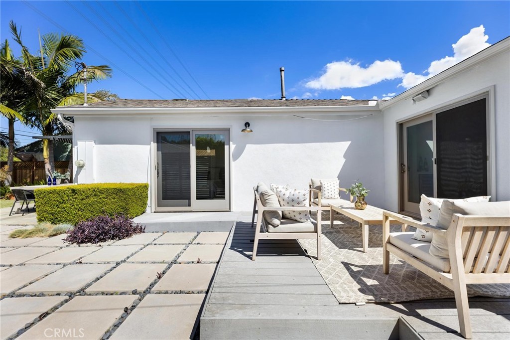 3219 Gibson Place Redondo Beach, CA 90278 - Photo 14 of 47 a view of a patio with table and chairs and potted plants