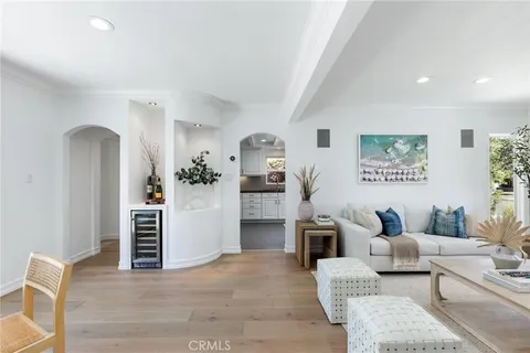 a kitchen with stainless steel appliances granite countertop a refrigerator sink and cabinets
