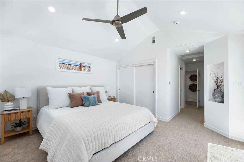 3219 Gibson Place Redondo Beach, CA 90278 - Photo 30 of 47 a bedroom with a bed and a ceiling fan