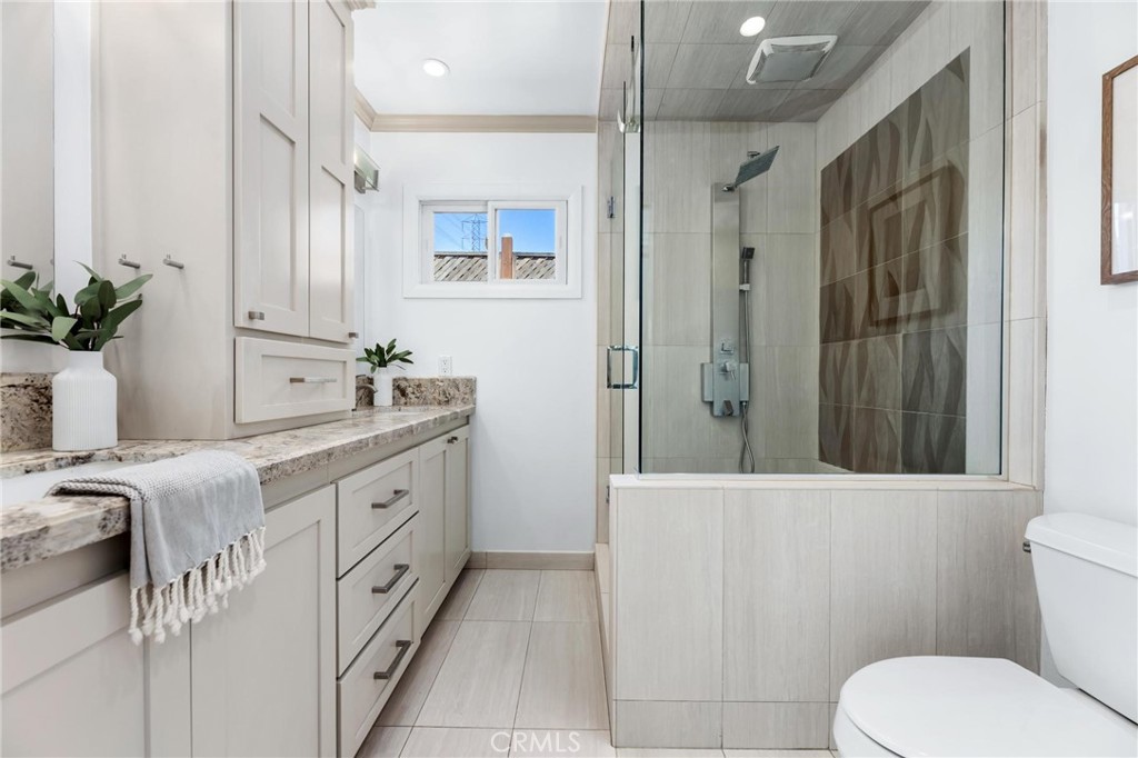 3219 Gibson Place Redondo Beach, CA 90278 - Photo 32 of 47 a bathroom with a granite countertop sink toilet and shower