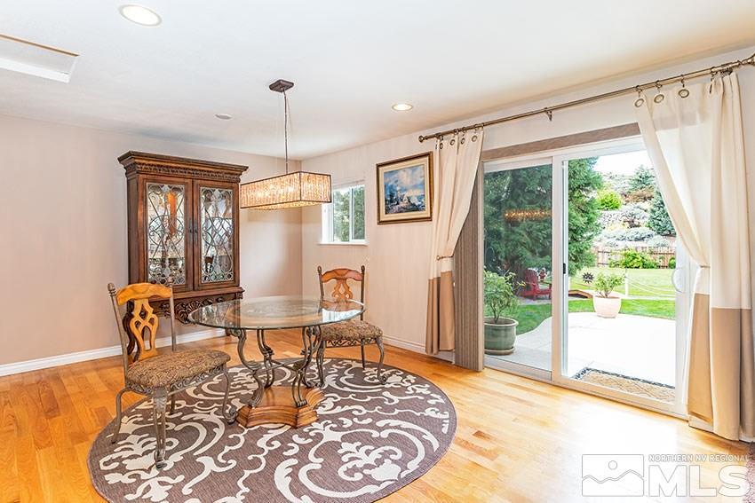 14345 Chamy Drive Reno, NV 89521 - Photo 1 of 15 a living room with furniture and a window
