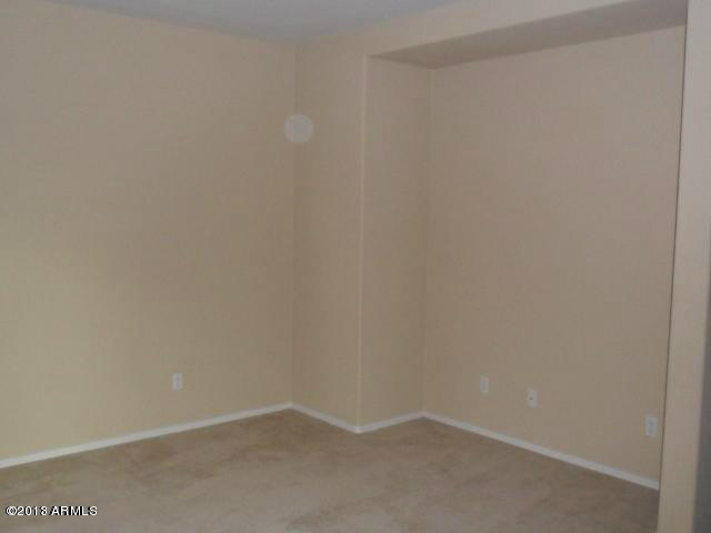 6444 West Beverly Road Laveen, AZ 85339 - Photo 13 of 20 family room 3