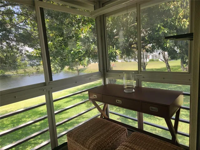 a view of a two chairs in the deck