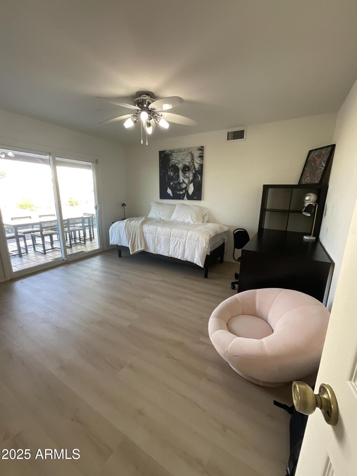 6802 North 26th Street Phoenix, AZ 85016 - Photo 25 of 39 a living room with furniture and a large window