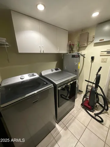 a kitchen that has a sink and a stove