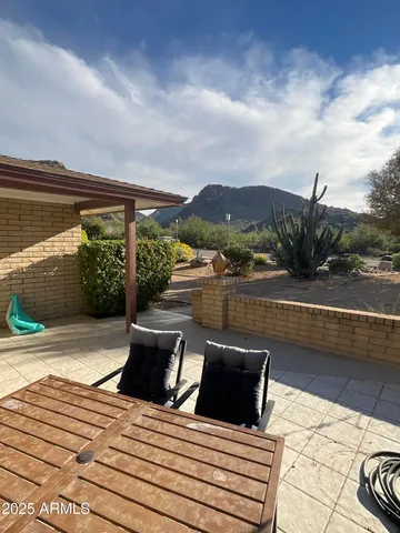 a view of a terrace with a bench
