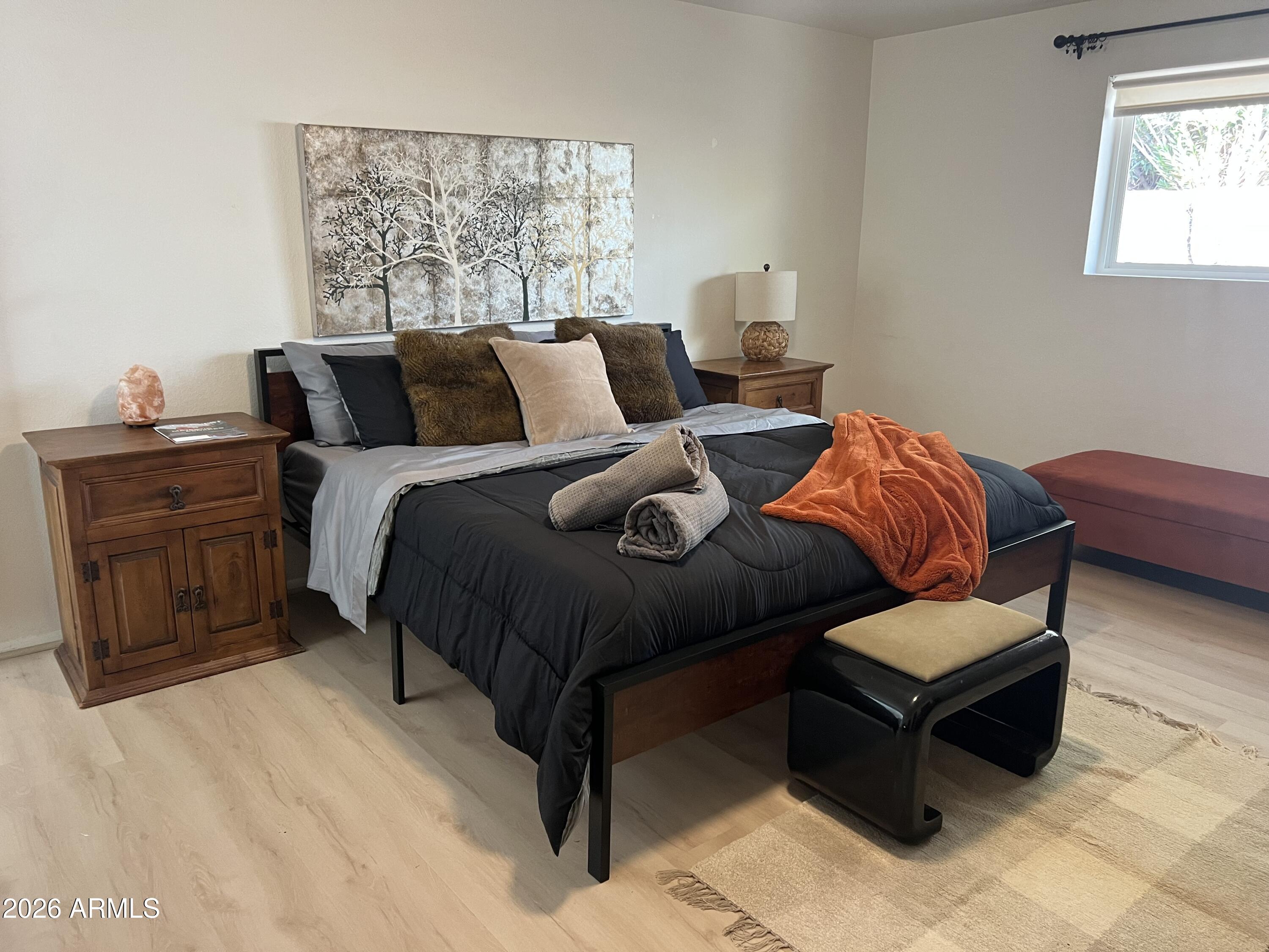 6802 North 26th Street Phoenix, AZ 85016 - Photo 3 of 39 a bedroom with a bed and window