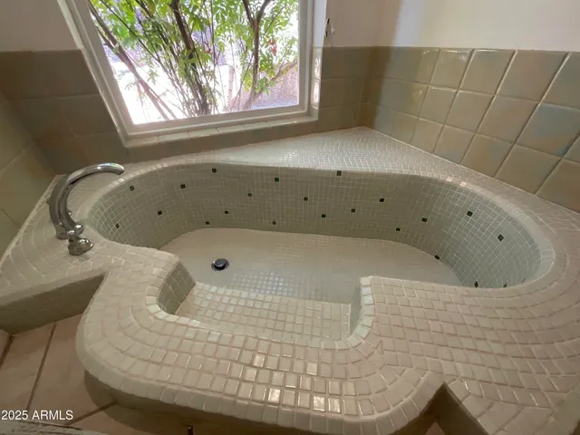 a bathroom with a bathtub