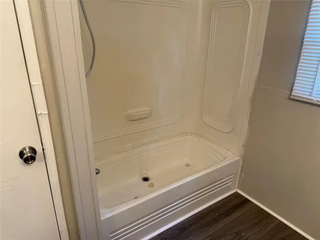 a bathroom with a bathtub