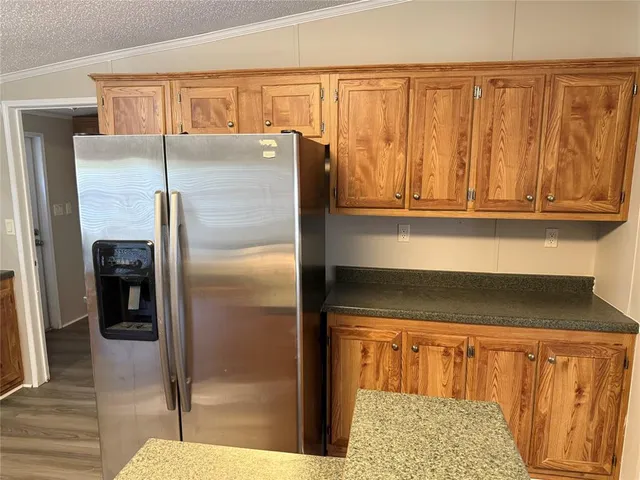 a kitchen with a refrigerator