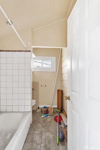 a view of entryway with wooden stairs
